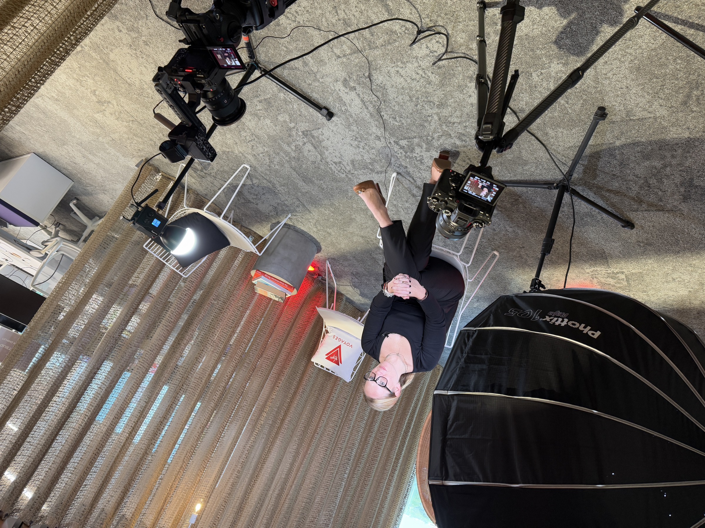 Wide interview setup with production lighting