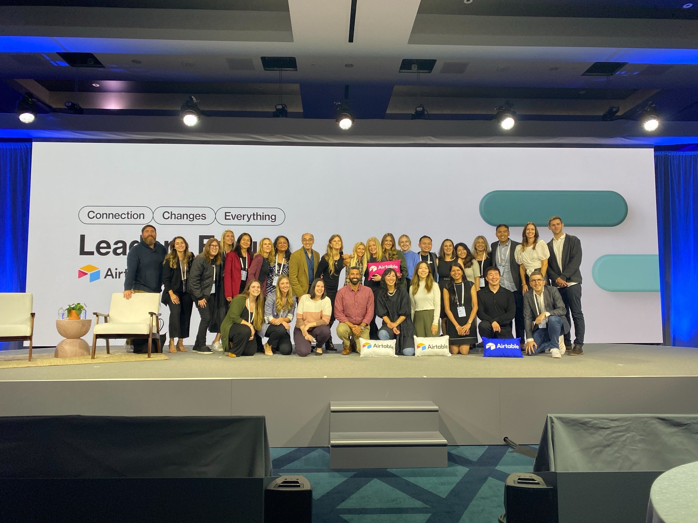 Airtable team group photo on stage