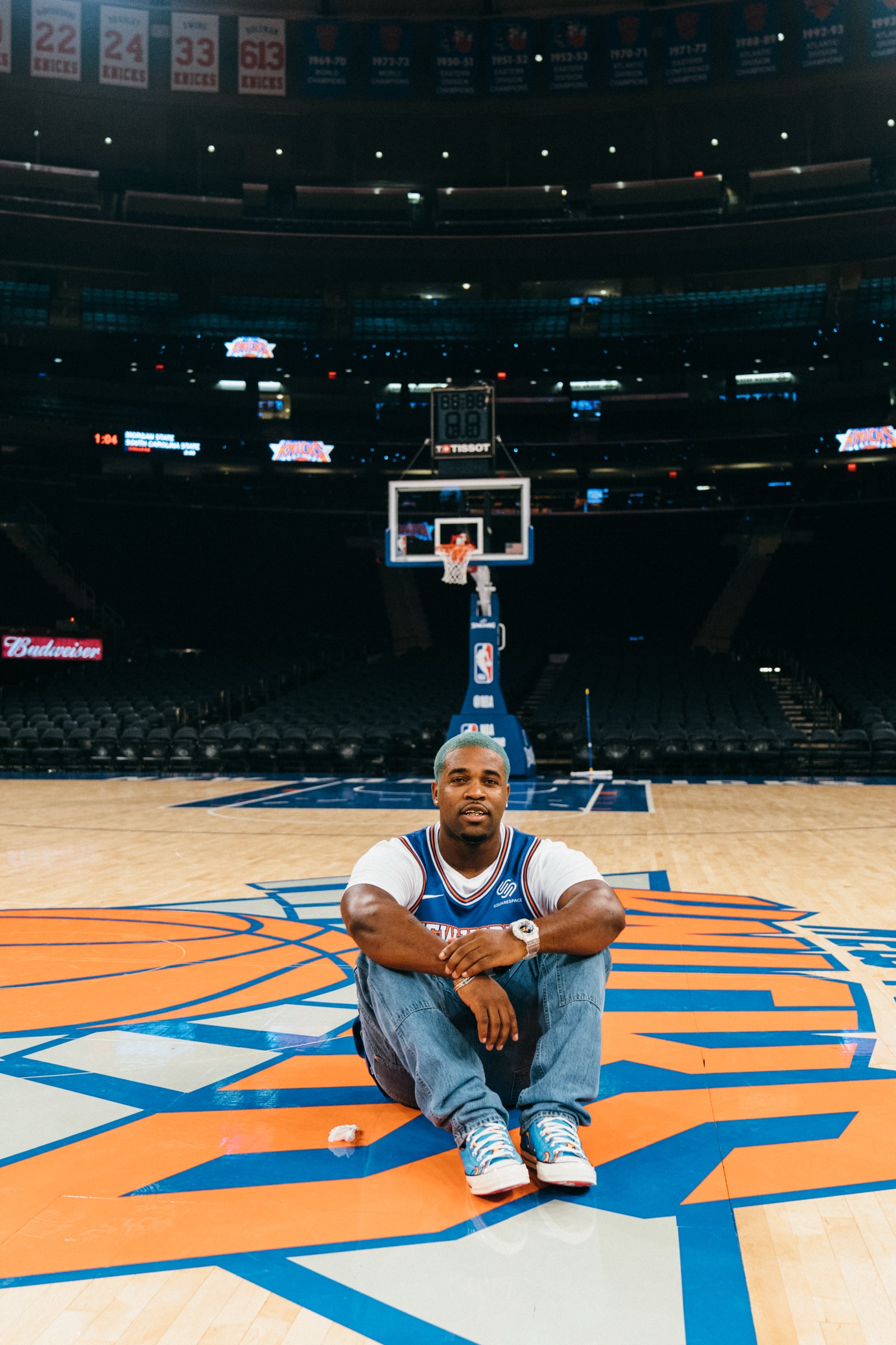 Kevin sitting center court at MSG